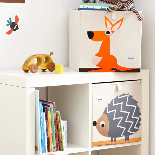 3 Sprouts Kangaroo Storage Box displayed in a child’s cube unit beside books and soft toys, showing its fun design and how it fits neatly into nursery shelving.