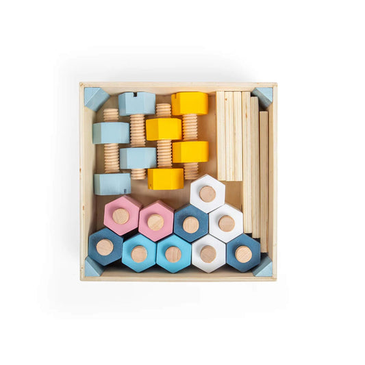 Top view of wooden nuts and bolts set, including pastel-coloured pieces and wooden connector plates, neatly organised in a wooden crate.