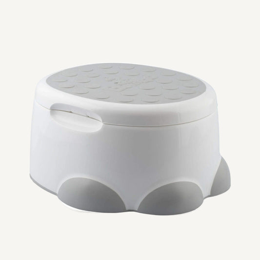 Bumbo Step ‘n Potty in Cool Grey with lid closed, shown in step stool mode.