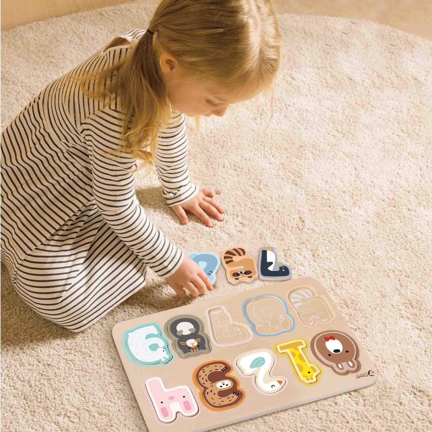 A child playing with a wooden Number Puzzle, featuring animal-themed wooden pieces for learning numbers 1–10 through hands-on fun.