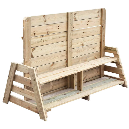 Side view of a wooden sand and water play wall set up outdoors, showing the mirrored tree, chutes and sensory features.