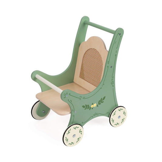 Side angle view of a wooden vintage-style dolls’ stroller with sage green frame, floral patterns, rattan-effect backrest, and cream wheels.