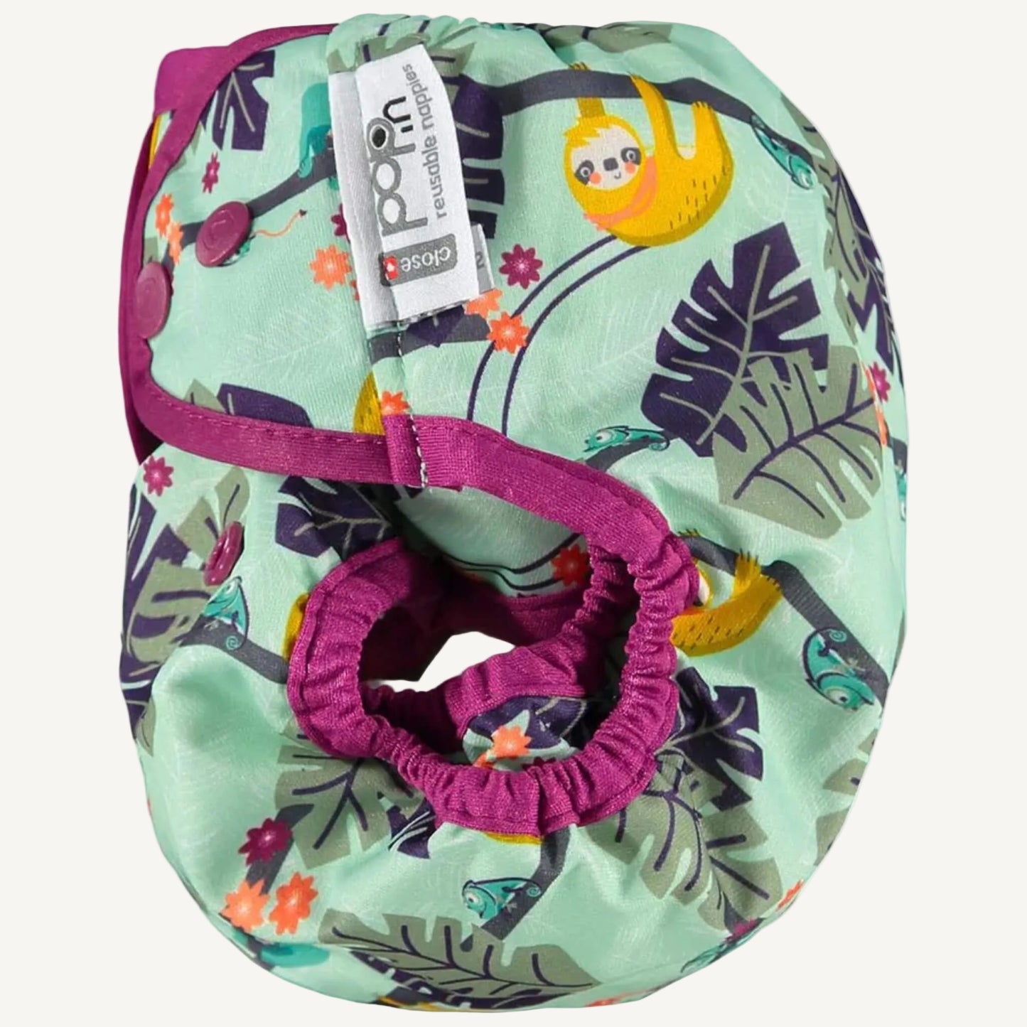 Side view of a reusable nappy cover folded to show the leg opening, purple binding and sloth print across the fabric.