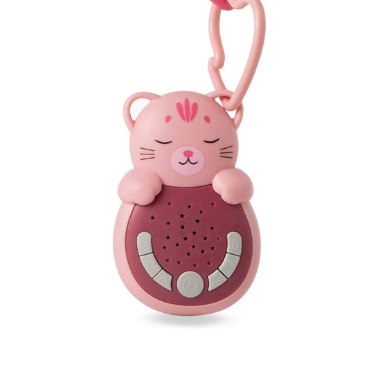 A small pink cat-shaped sound machine sleep aid with closed eyes and rounded body, showing a star-speckled speaker panel and curved row of control buttons beneath its paws.