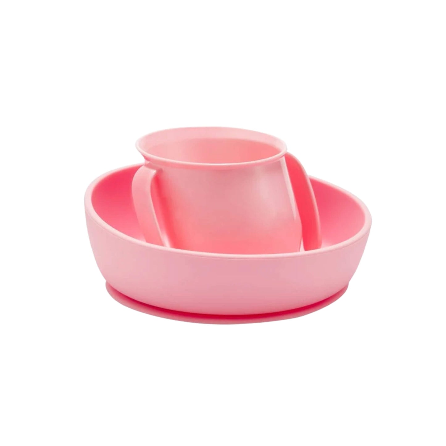 A pink Doidy Cup and Bowl displayed together, featuring the brand’s signature slanted designs to support independent feeding and reduce spills for babies and toddlers.