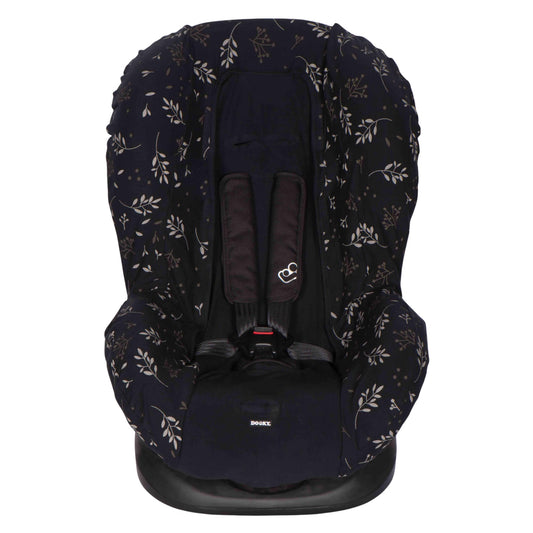 A front-facing Group 1 car seat with a fitted seat cover in a dark leaf print design and a white harness clipped in the centre.