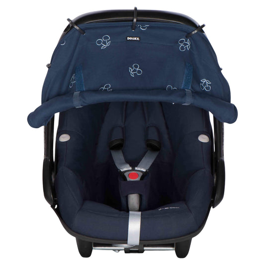 A blue cotton sunshade with white cherry print attached to an infant car seat. The fabric is rolled down and secured at the bottom, covering the seat area fully.