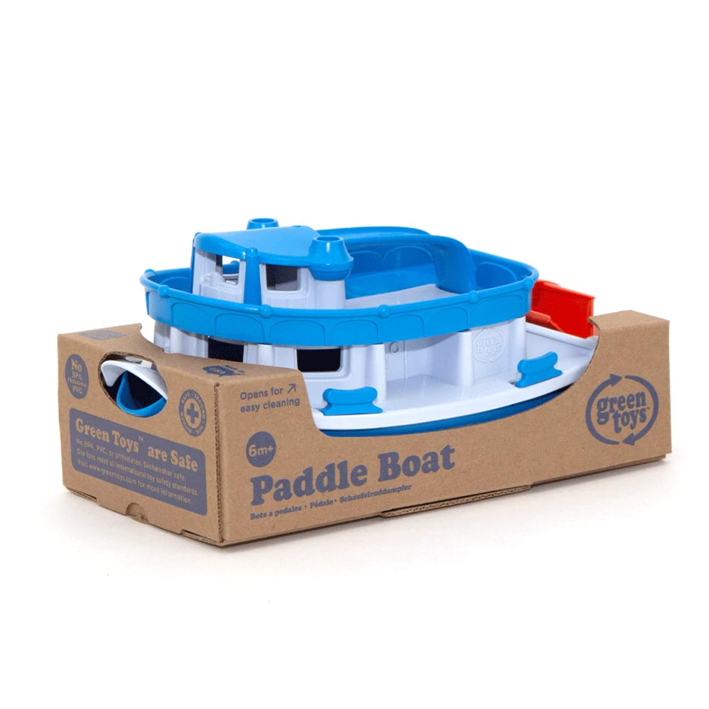 Green Toys Paddle Boat in its recycled cardboard packaging, showing product name and age suitability (6m+).