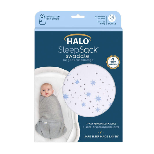 HALO SleepSack Swaddle in Midnight Moons Blue print shown in packaging. Cotton fabric, 1.5 TOG, for babies aged 3–6 months.