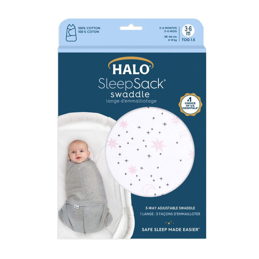 HALO SleepSack Swaddle in Midnight Moons Pink print, shown in packaging. 1.5 TOG, 100% cotton, suitable for ages 3–6 months.