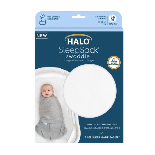 HALO SleepSack Swaddle in white, shown in packaging. 1.5 TOG, 100% cotton, suitable for ages 3–6 months.