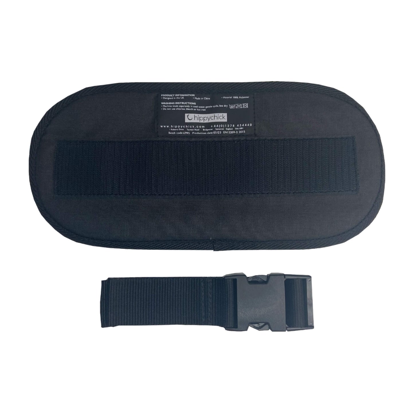 Hippychick Hipseat Extension in black denim fabric with waistband strap and buckle laid flat.