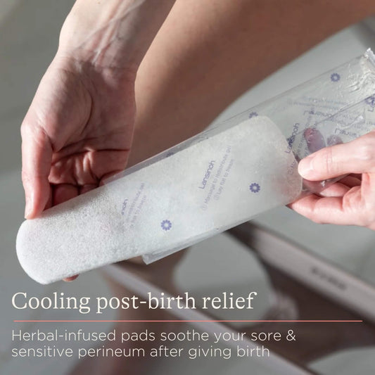 A woman removing a postpartum padsicle from its wrapper, showing the ready-to-use cooling pad designed for post-birth comfort.