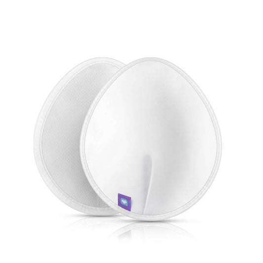 Two washable nursing pads displayed side by side, highlighting their soft texture, absorbency, and contoured shape for a comfortable fit.