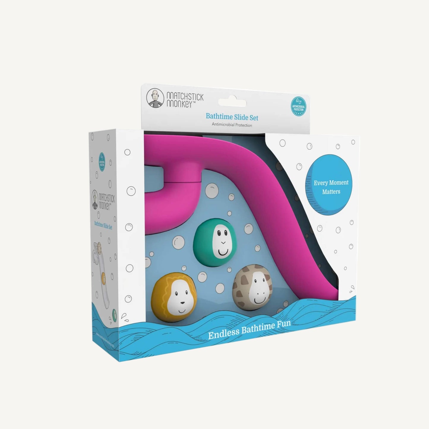 Retail packaging displaying a pink bathtime slide toy and three animal character balls through a clear window, with bubble graphics printed on the box.