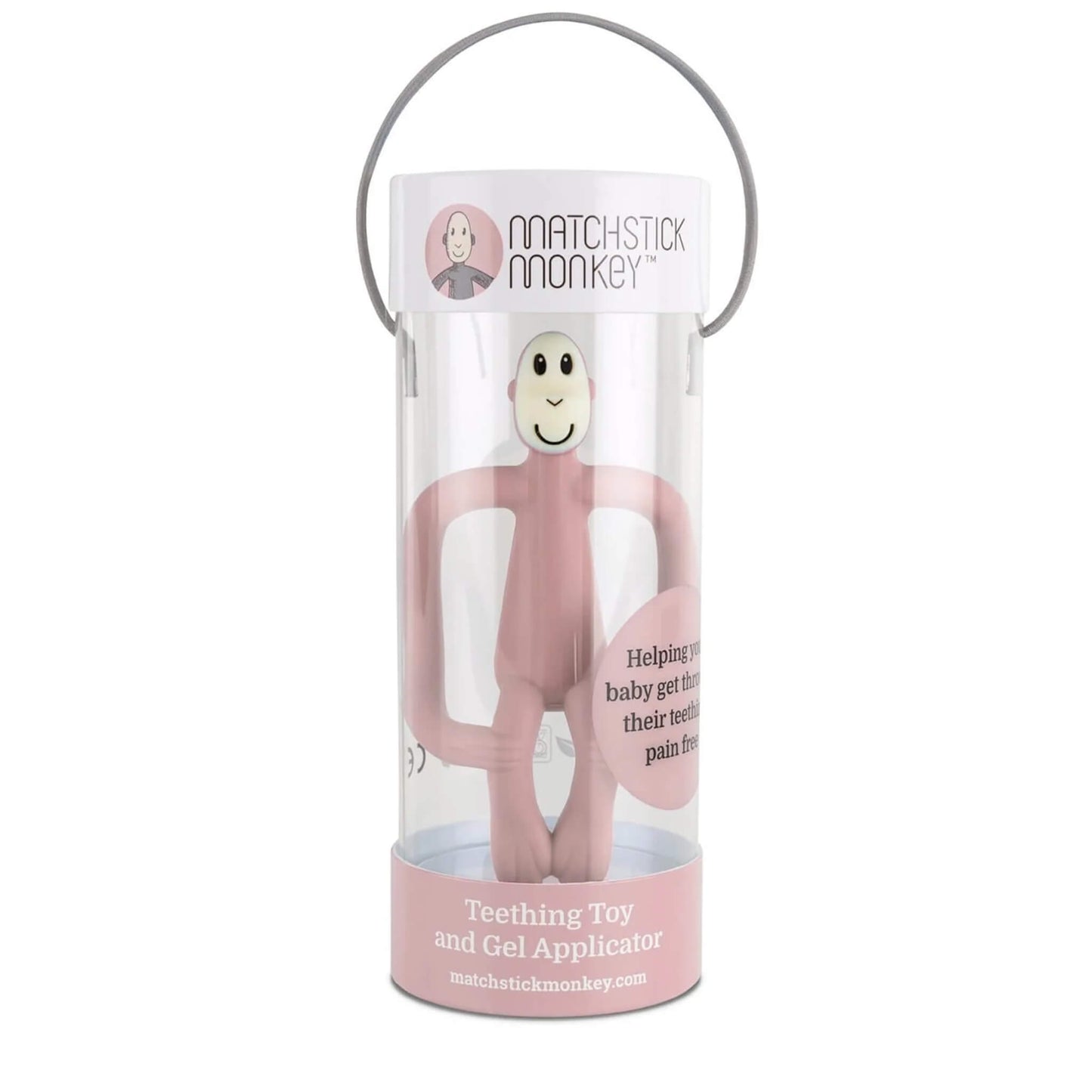 A dusty pink monkey-shaped teething toy packaged vertically inside a clear cylindrical gift tube with a handle.
