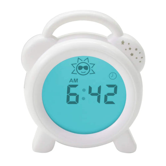 Sleep trainer clock showing blue morning display with AM time, sun icon and digital numbers, indicating wake-up time using blue light technology.
