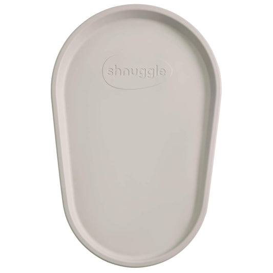 The Shnuggle Squishy Changing Mat in taupe, a soft and supportive baby changing surface with contoured edges and wipe-clean finish.