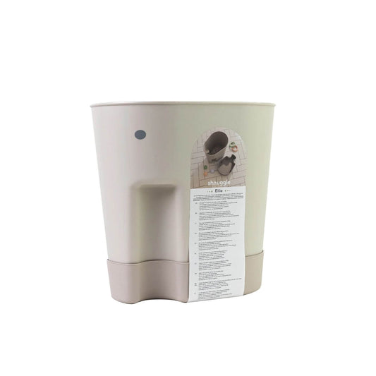 Shnuggle bath toy drying caddy in taupe, shown with packaging label displaying features and an image of the caddy in use.