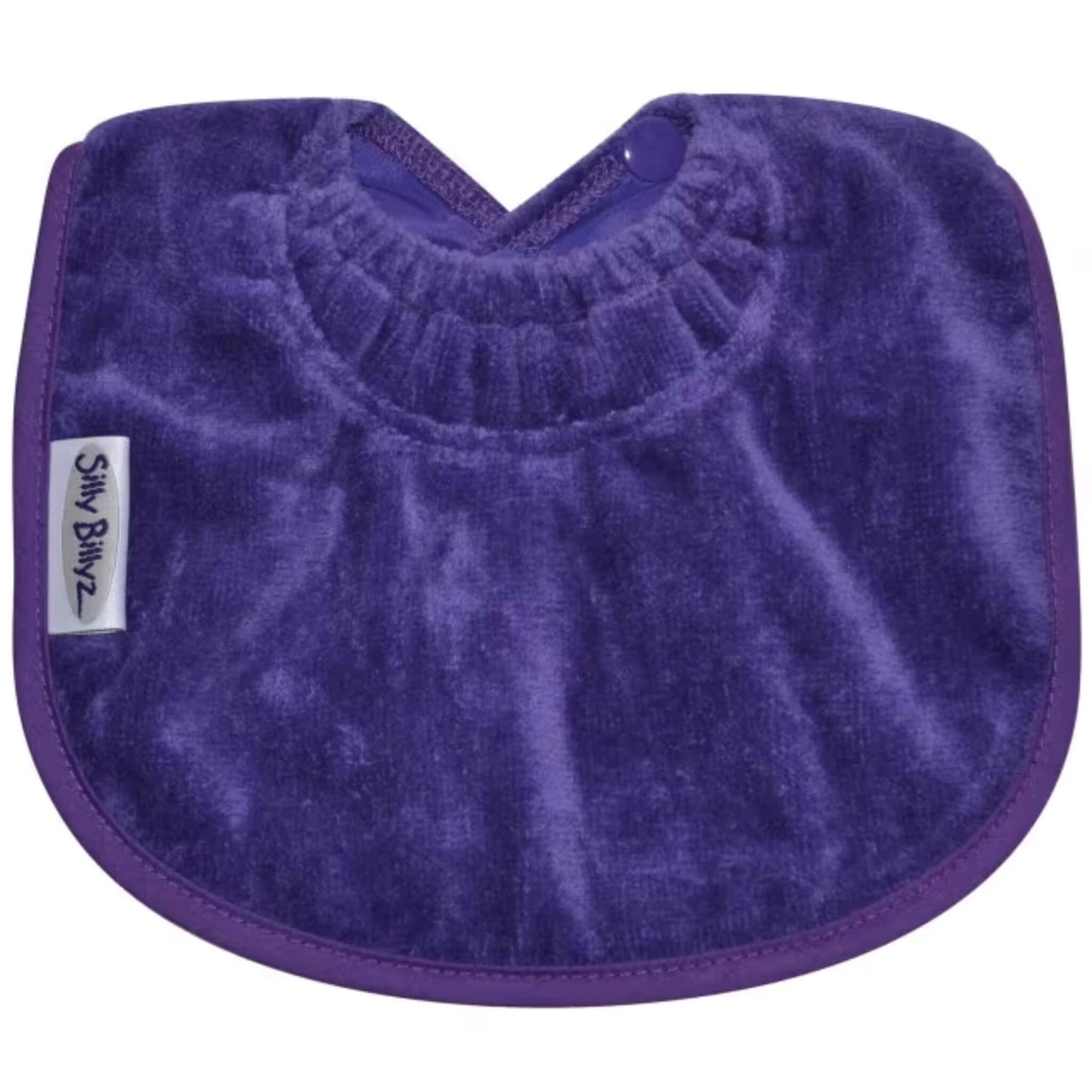 Silly Billyz Towel Biblet in purple, shown laid flat with a compact curved shape, soft cotton towelling front, gathered neckline, and a single snap closure designed for a snug newborn fit.
