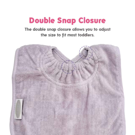 Close-up of a lavender baby bib showing the gathered snuggle neck design with double snap fastenings for adjustable sizing.