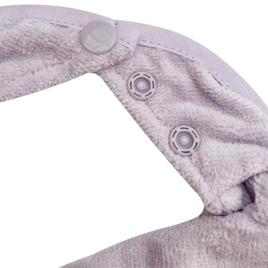 Close-up of Silly Billyz towel bandana bib in lavender, showing soft towelling fabric and secure pop-stud closure for adjustable fit.