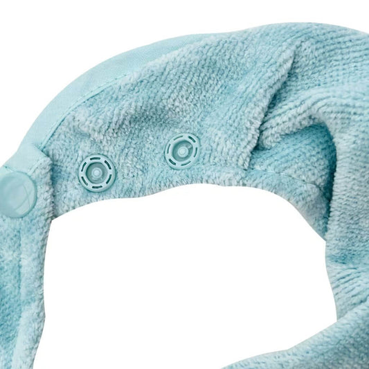 Close-up of Silly Billyz Maitai Bay towel bandana bib, showing soft towelling fabric and secure pop-stud closure for adjustable fit.