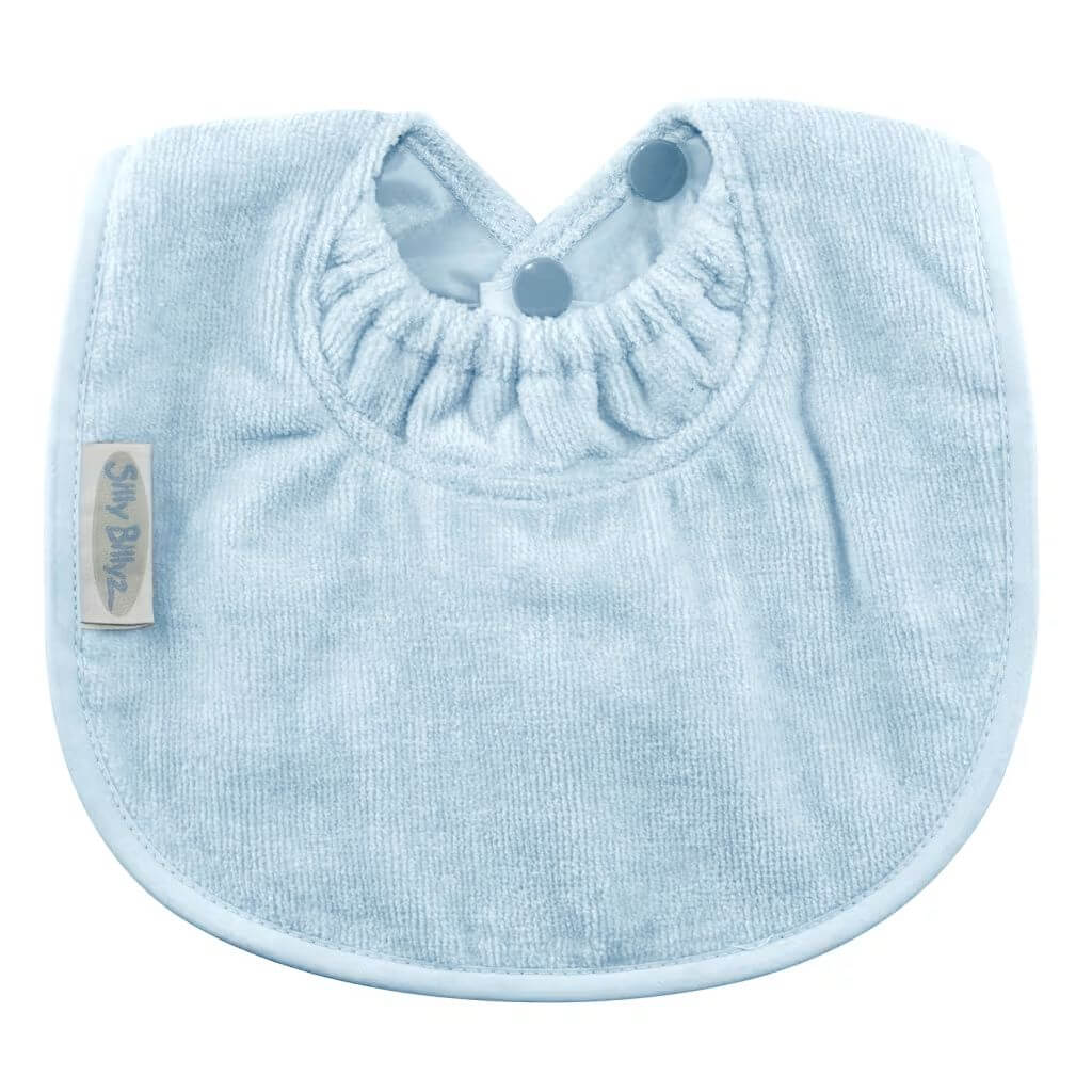Silly Billyz Towel Biblet in dusty blue with double snap closure, soft towelling fabric, and a snug neck guard for maximum comfort and spill protection.