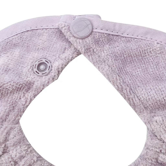 Close-up of Silly Billyz Towel Biblet in lavender, showing adjustable snap closure detail for a secure and customisable fit around the neck.