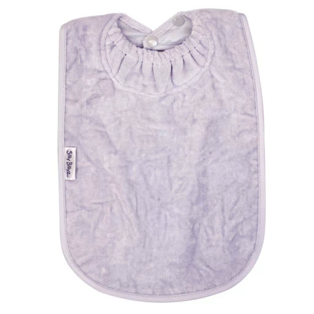 Lavender Silly Billyz Towel XL Bib provides extra-large coverage with a soft, absorbent front and waterproof backing to keep messes under control.