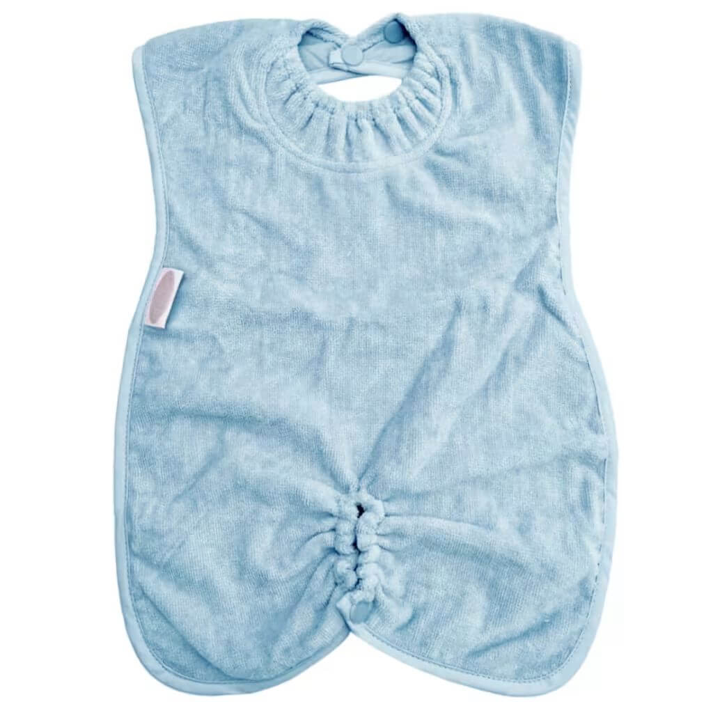 Silly Billyz Highchair Hugger Bib in dusty blue featuring absorbent towelling fabric, adjustable snap closure, and ruched bottom for full lap coverage.