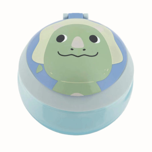 A round plastic ltoddler snack box with a light blue base and lid, featuring a cartoon dinosaur face printed on top in green, beige, and blue.
