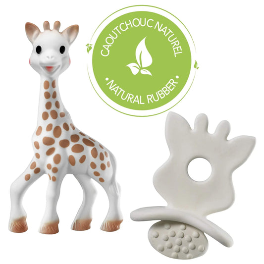 A natural rubber giraffe teething toy standing upright beside a leaf-shaped rubber teether with a central grip hole and raised textured dots, shown alongside a green circular natural rubber certification badge.
