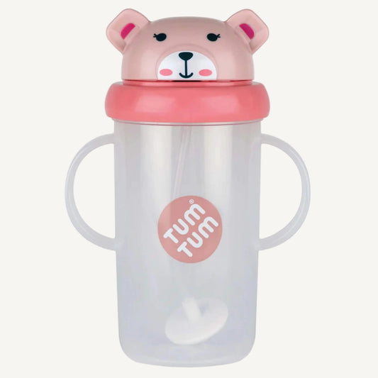 A clear handled large sippy cup with a pink flip-top lid, bear character design, and an internal weighted straw visible inside the cup.