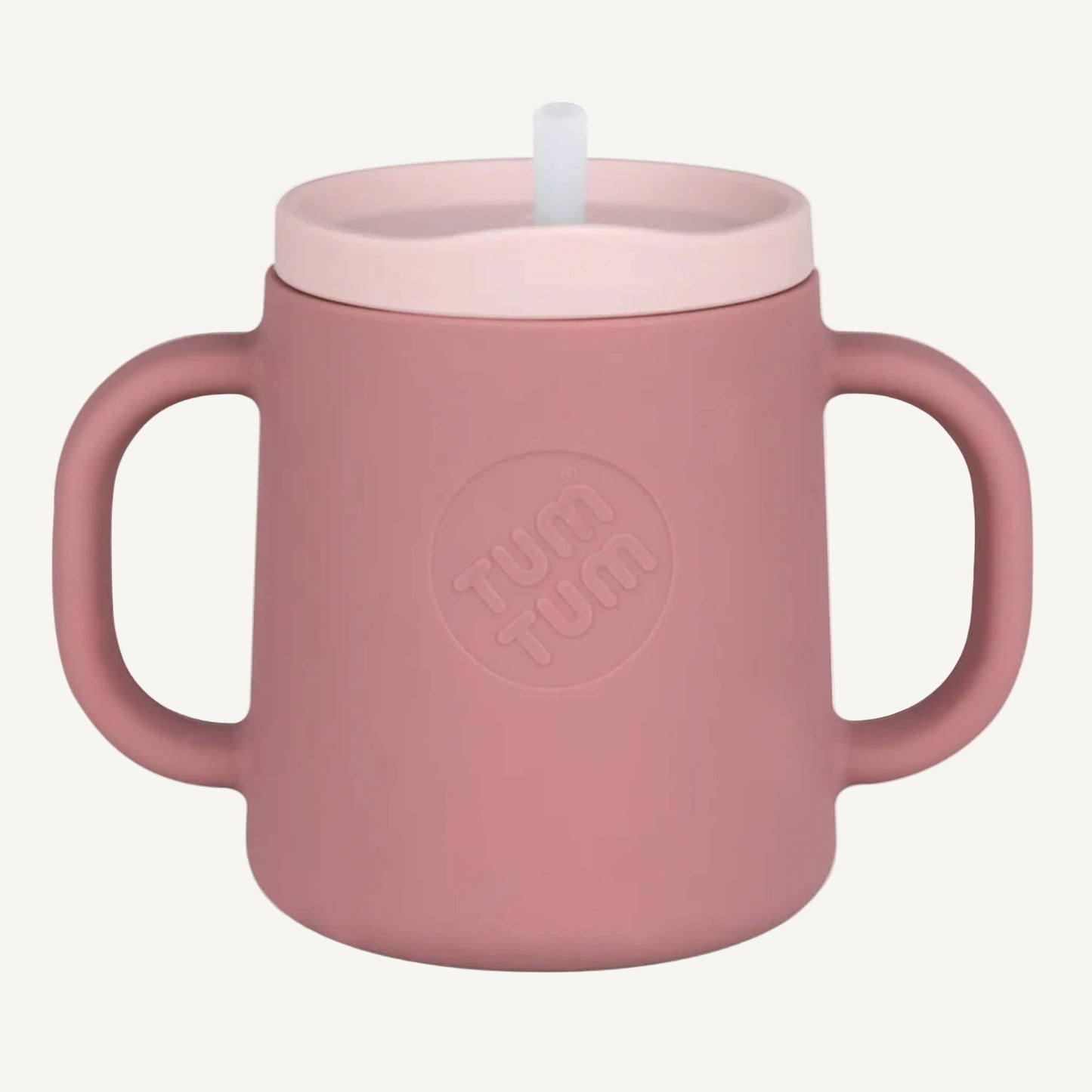 A pink silicone trainer cup with two handles and a straw lid, shown from the front to highlight the cup shape and grip.
