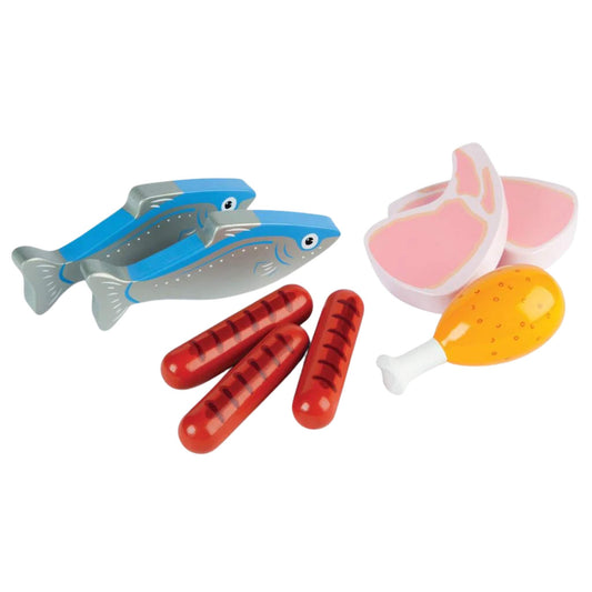 Toy meat and fish pieces including sausages, fish, lamb chops and a drumstick from a wooden food play set arranged outside of the crate.