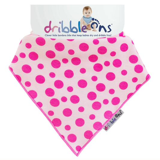 Pink bandana bib with bright pink spot pattern, soft cotton fabric and Dribble Ons label tag at the side.
