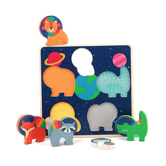 Wooden puzzle board with several animal-shaped pieces removed, showing textured surfaces beneath each slot.