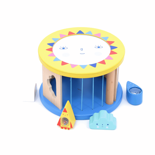 An animated gif of the Vilac Night and Day Shape Sorter in action, featuring a cheerful sun design, interactive wooden shapes, and multi-activity elements.