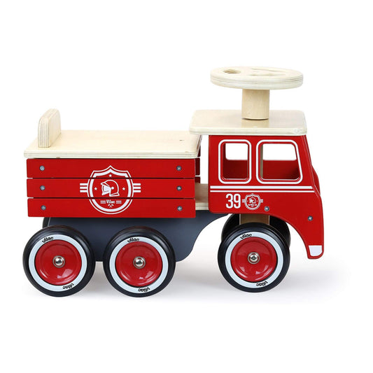 Vintage-design Ride-On Fire Truck in red, featuring rubber tyres, a sturdy wooden frame, and a seat with built-in storage for toys.