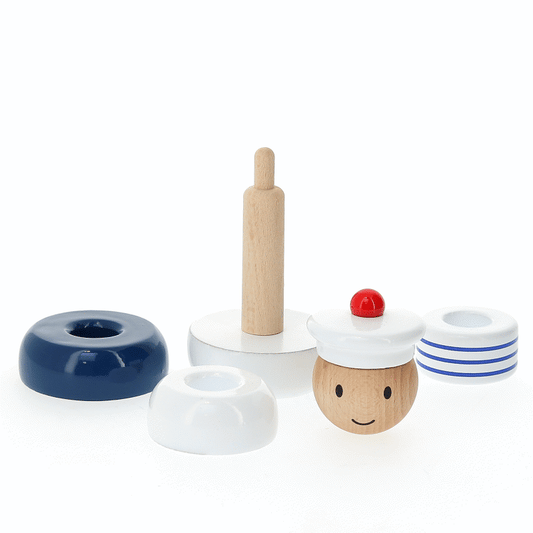 Animated gif of the Wooden Vilac Sailor Stacking Toy with removable blue, white, and striped pieces, featuring a cheerful sailor face and sailor's hat.