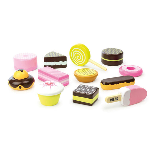 Twelve brightly painted wooden pastries, biscuits, and sweets from the Vilac Wooden Pastry Set, ideal for children's pretend play.
