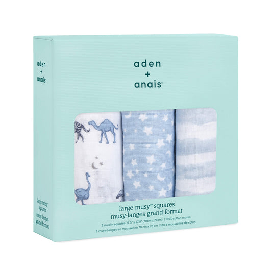 Boxed set of three aden + anais Rising Star muslin squares in blue-themed animal, star, and stripe designs.