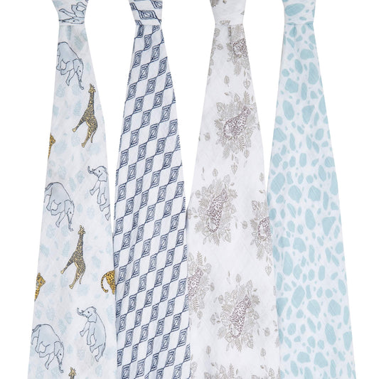 Four aden + anais Jungle cotton muslin swaddles hanging to show full print detail, including animals, geometric shapes and organic patterns.
