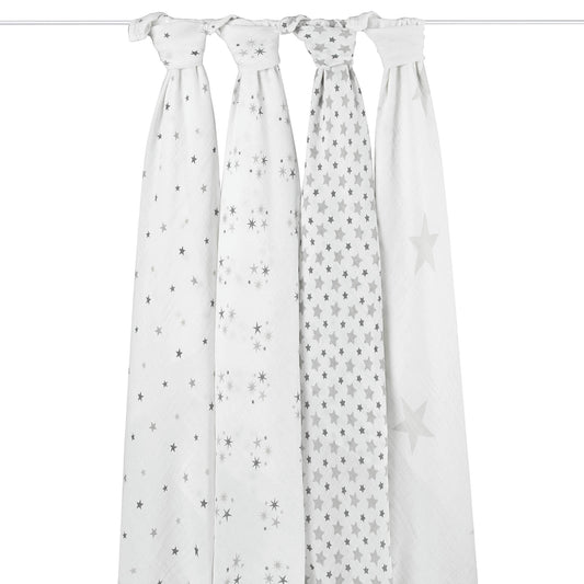 Hanging aden + anais Twinkle swaddles. Four cotton muslin blankets with star prints. Lightweight and ideal for newborn swaddling.