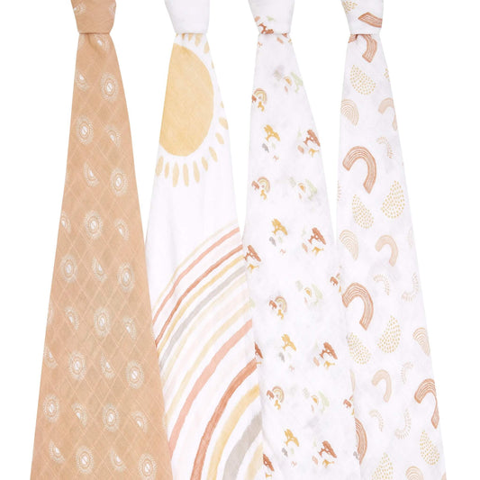 Aden + anais 4-pack Keep Rising swaddles displayed hanging. Includes rainbow, sun, savannah animal and circular patterns on soft cotton muslin for multi-use baby care.