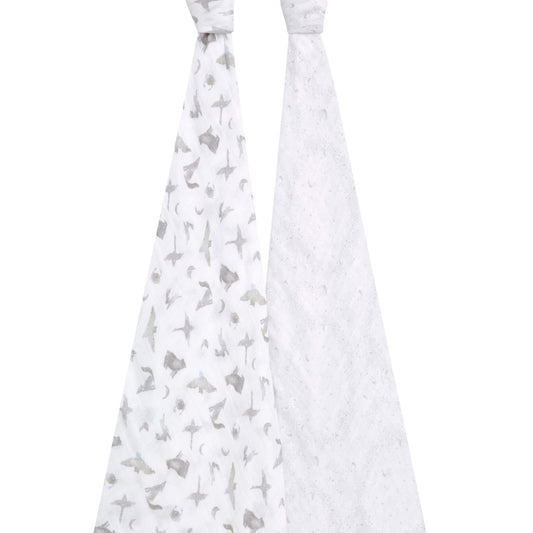 Two muslin swaddle blankets in dreamy grey moon and star prints, tied and hanging to show full pattern detail.