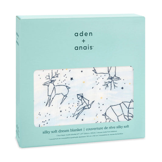 aden + anais Silky Soft Dream Blanket in Stargaze print boxed in signature mint packaging. Features navy constellation animals and stars on breathable muslin.