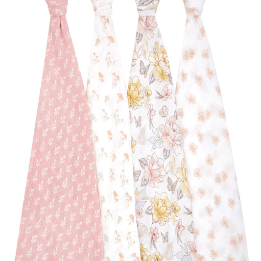 Four Earthly collection swaddles hanging side by side, showing soft leaf, mushroom, floral and butterfly prints. Organic cotton baby muslin blankets.