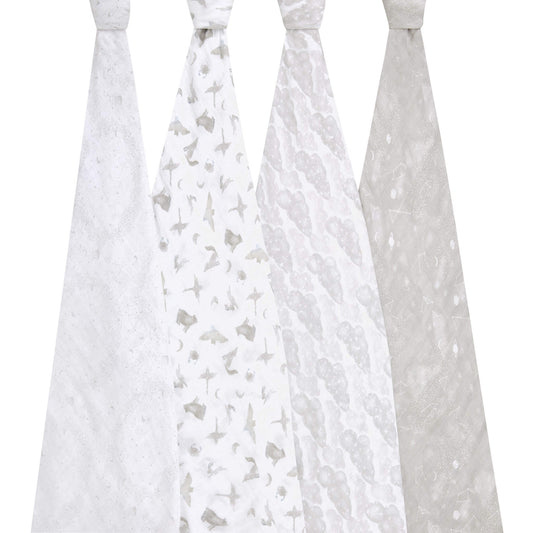 Four hanging aden + anais Map the Stars muslin swaddles with soft galaxy-inspired designs. Breathable and gentle on baby's delicate skin.
